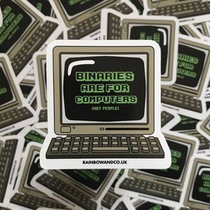 May include: A sticker featuring a retro computer with the text "Binaries are for computers (not people)" on the screen. The sticker is beige and brown with green text. The sticker is from Rainbowandco.uk.