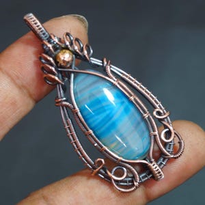 Intricate wire wrapping Wire wrap agate pendant Custom wire wrap pendant Wire wrap with blue stone jewelry Black copper wire wrap necklace