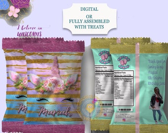 May include: A printable design for unicorn-themed party favor bags. The bags feature a unicorn head with a floral crown, gold glitter, and the text "I believe in unicorns". The design also includes a personalized name, "Mariah", and the text "Intricatelymade".