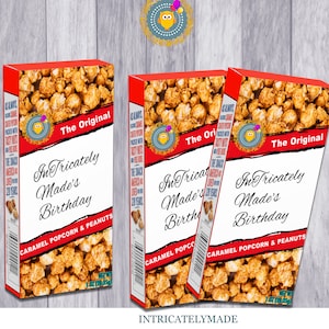 May include: Three red boxes with white text and images of caramel popcorn. The boxes are labeled "The Original" and "InTricately Made's Birthday". The boxes are for caramel popcorn and peanuts, and each box weighs 1.02 oz (28.35g).
