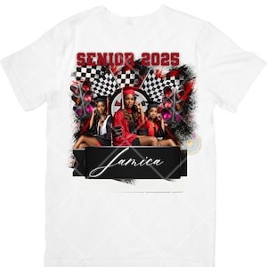 May include: White t-shirt with a black and red design featuring three women in graduation caps and gowns. The design includes checkered flags, traffic lights, and the text "Senior 2025" and "Jamaica".