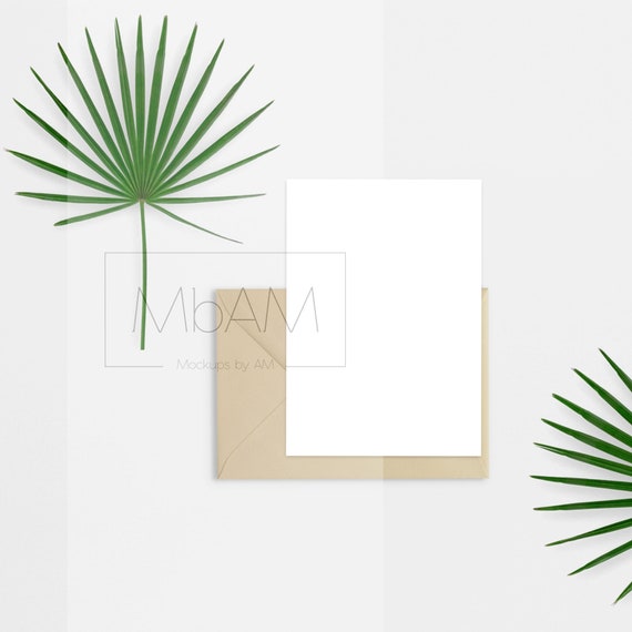 Stationary postcard mockup Invitation flatlay scene with tropical leaf JPG mock up