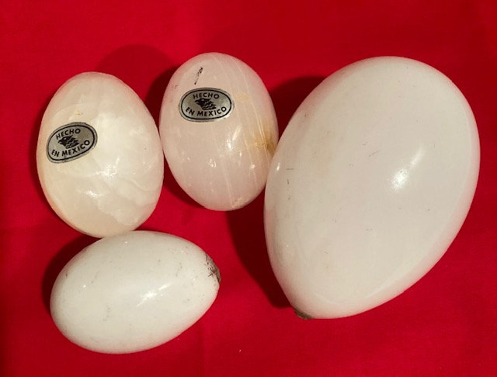 Vintage White Glass Hand Blown Darning Eggs 2 are from Hecho Etsy