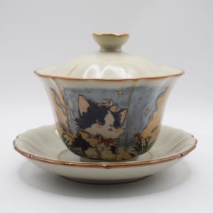 Gaiwan-theekop met ijsbarstenpatroon, schattige cartoonkat, Chinees theekopje met schotel en deksel, met de hand getekend patroon