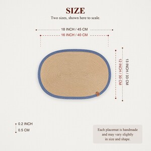 Size guide for the oval jute placemat with blue rope border: 18 x 13 inches / 45 x 33 cm and 16 x 12 inches / 40 x 30 cm, both 0.2 inches / 0.5 cm thick.