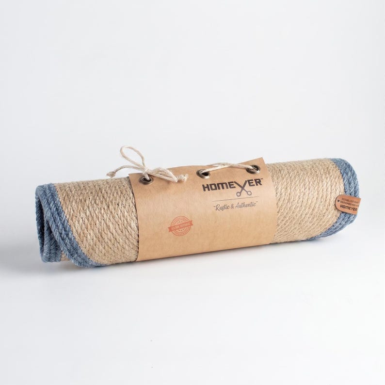 Homever oval jute placemats rolled and wrapped in kraft paper packaging with a handmade tag, ready to gift.