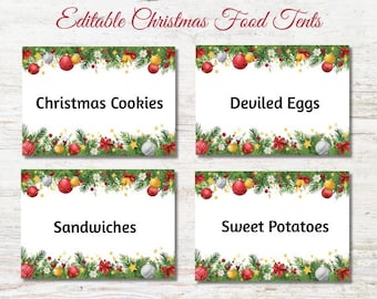 May include: Four white rectangular Christmas food tents with festive decorations. Each tent features a different food item: Christmas Cookies, Deviled Eggs, Sandwiches, and Sweet Potatoes. The tents are adorned with red, gold, and silver ornaments, bows, and greenery.