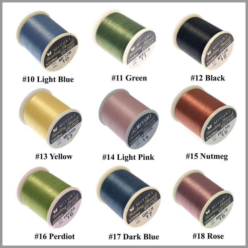 May include: Nine spools of Miyuki beading thread in various colors including light blue, green, black, yellow, light pink, nutmeg, perdiot, dark blue, and rose. Each spool is labeled with a number, color name, and technical specifications.