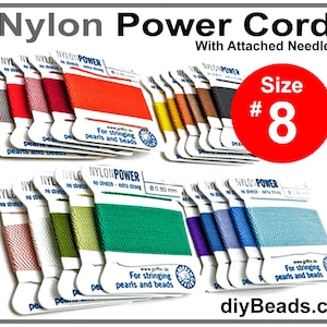 May include: Assortment of nylon power cord in various colors, size #8, with attached needle, for stringing pearls and beads.  The cord is packaged in small white boxes with the brand name "Nylon Power" printed on them.