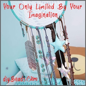 May include: A dreamcatcher featuring a turquoise beaded hoop with a white web and the text "You are only limited by your imagination" and "diy beads store". Hanging elements include a beaded feather, turquoise beads, and fabric stars.