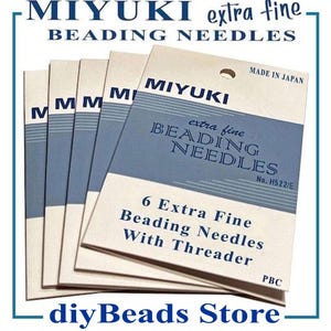May include: A set of five paper packets of Miyuki extra fine beading needles. Each white and blue packet is labeled with the text Miyuki, extra fine beading needles, No. H522/E, and 6 extra fine beading needles with threader, made in Japan.