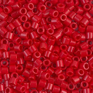 May include: A close-up shot of numerous small, cylindrical, bright red beads. The beads are evenly distributed, filling the frame. Each bead has a hole running through its center, creating a consistent pattern. The glossy finish of the beads reflects light, enhancing their vibrant color.