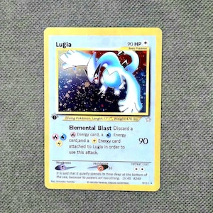 Kugio - Delvis Cosmo Holo - 1:a upplagan - Pokémon Proxy-kort