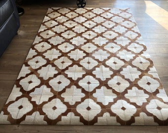 Hand Stitched Cowhide Rug: Brown and White Patched Leather