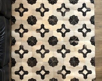 Hand Stitched Cowhide Rug: Grey and White Floral Patched Leather