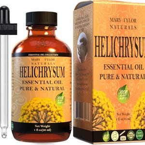 May include: A brown glass bottle with a dropper filled with Helichrysum essential oil. The bottle is labeled "Mary Tylor Naturals Helichrysum Essential Oil Pure & Natural" and has a 100% plant-based label. The bottle is sitting on a white surface.