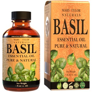 May include: A brown glass bottle with a black cap containing Mary Tylor Naturals Basil Essential Oil. The bottle is labeled with the product name, "Basil Essential Oil Pure & Natural", and a 100% plant-based logo. The bottle is sitting on a white surface.