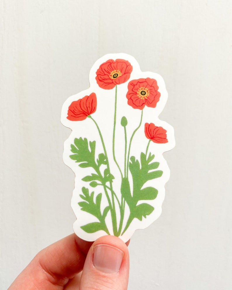 May include: A sticker featuring a cluster of red poppy flowers with green leaves and stems.