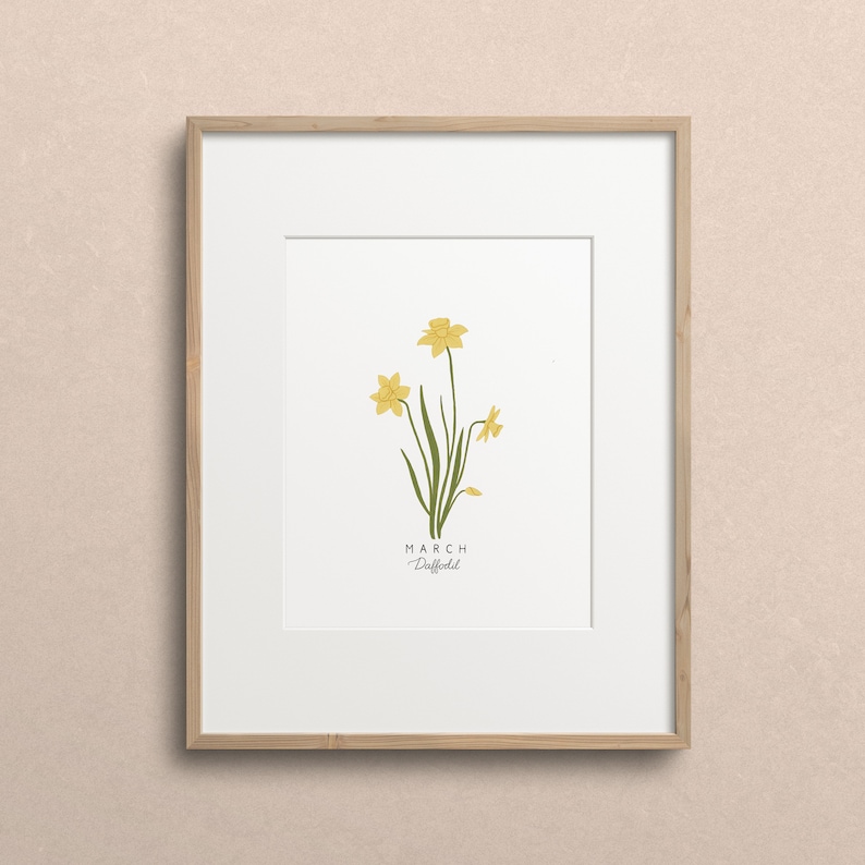 May include: A framed print with a drawing of yellow daffodils and the text "MARCH Daffodil".