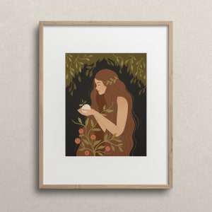 May include: A woman with long brown hair holds a white apple in her hands. She is surrounded by green leaves and red berries. The background is a dark green.