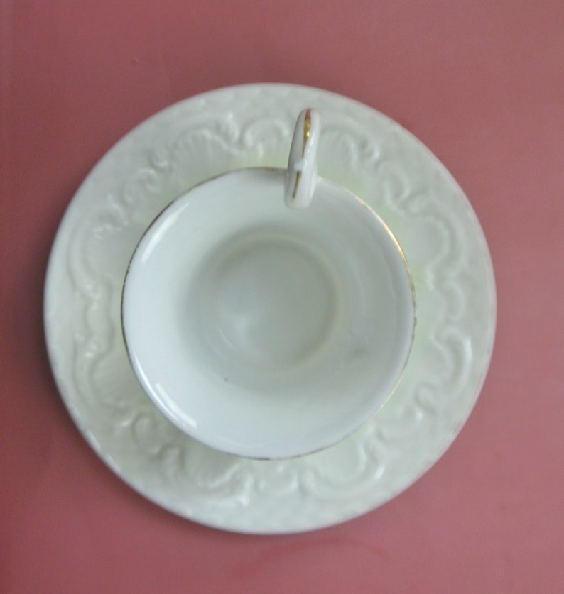 Vintage Beautiful Ornate Green and White Cup and Saucer