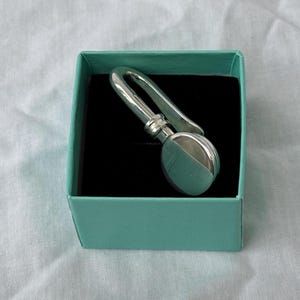 Gancho o pinza para servilletas de plata de ley de 1998 de Hugh Crawshaw, en caja