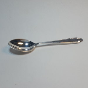 1954: één theelepel in sterlingzilver van Barker Brothers