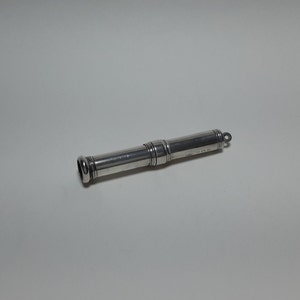 1909 sterling silver chaterel or Pencil holder by Edward Baker