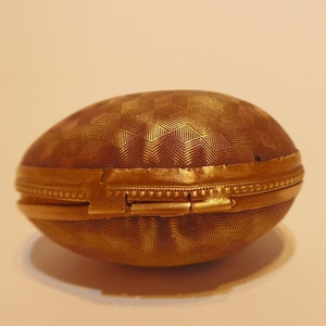 Egg chatelaine thimble case