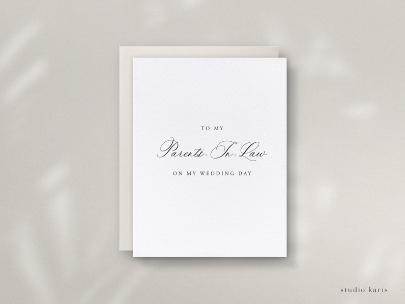 Może przedstawiać: Biała kartka z tekstem "To my Parents-In-Law On my Wedding Day" w czarnej kaligrafii.