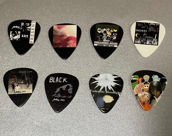 Audrey and Kate Special Merch - Guitar Picks Set of 8 from past singles and albums