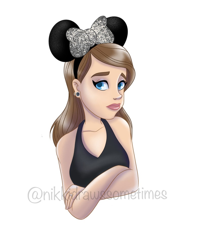 May include: A woman with brown hair and blue eyes is wearing a black tank top and a silver glitter headband with black mouse ears. She has a serious expression on her face and her arms are crossed.