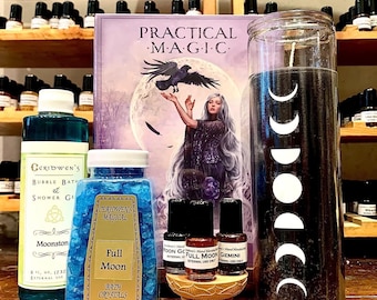 May include: A purple book titled "Practical Magic" with a black raven and a woman with long white hair on the cover.  There are three small bottles of essential oil, a jar of blue bath crystals, and a black candle with a white moon phase design.