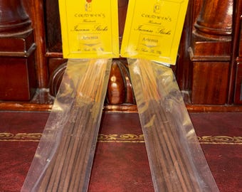 May include: Two packages of incense sticks, each with a yellow label. The labels read "Cerdwen's Handmade Incense Sticks Artemis". The incense sticks are brown and packaged in clear plastic.