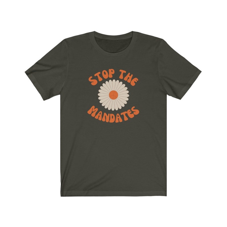May include: A dark green t-shirt with a white daisy and the text "STOP THE MANDATES" in orange.
