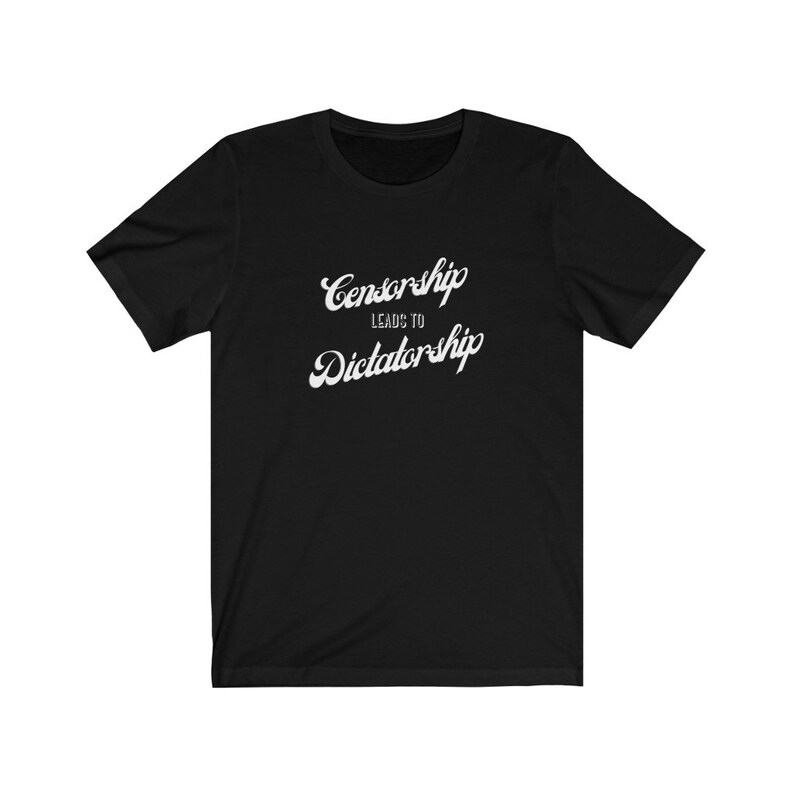 May include: Black t-shirt with white text that reads "Censorship Leads to Dictatorship".
