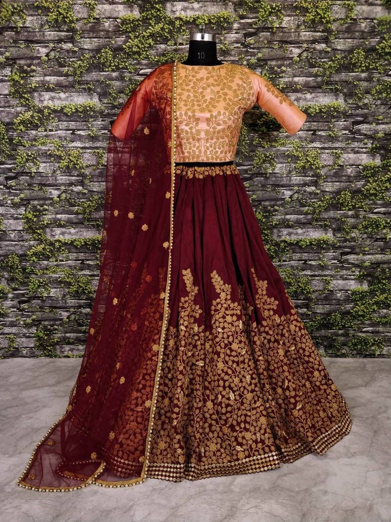 golden gown with maroon dupatta