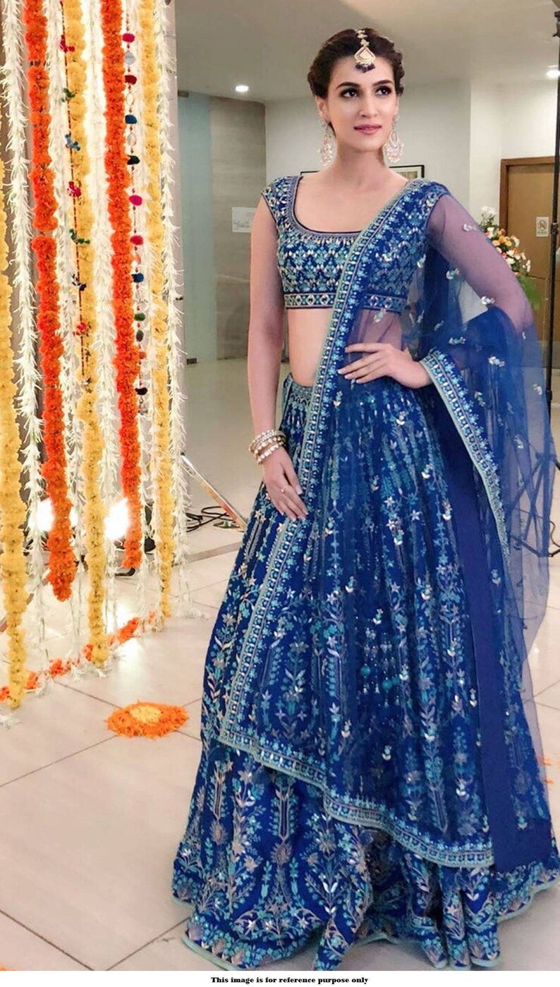 blue lehenga with yellow dupatta