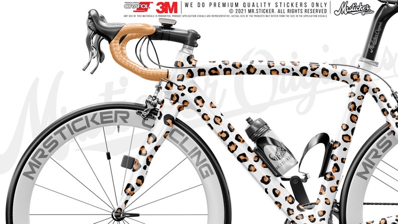 May include: A white road bike with a leopard print design. The bike has a brown handlebar and black wheels. The text "MR.STICKERCLING" is printed on the side of the bike.
