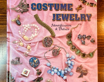 Unsigned beauties of costume jewelry: identification and values by Marcia Sparkles Brown hardback book