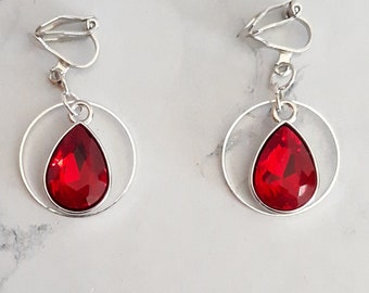 Clip on earrings dangle drop red facet rhinestones in silvered ring hoop, evil eye earrings, cat eye earrings, statement jewel