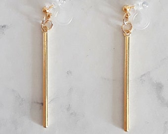 Invisible clip on earrings dangle golden bar rod cylindric stem, geometric, ethnic fashion jewel boho statement trendy bold non pierced