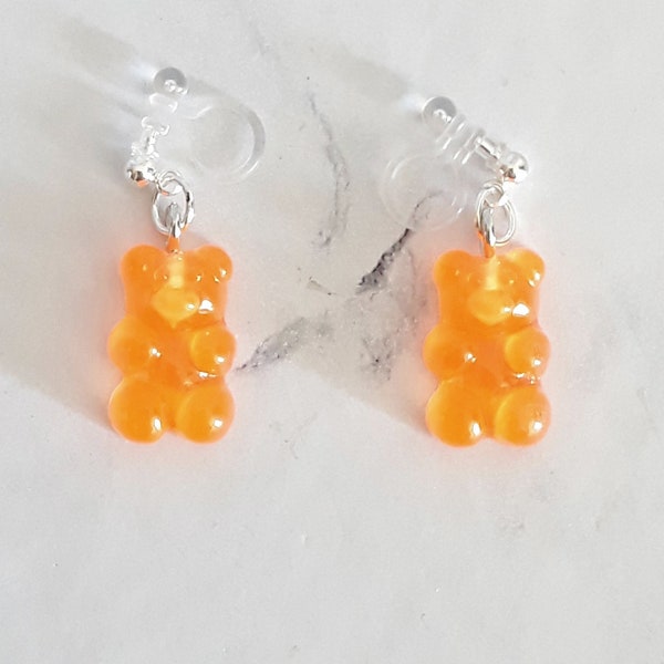 Boucles d'oreilles clip transparent nounours orange personnage ourson mignon kawaii fun minimaliste, bijou enfant amusant rigolo original