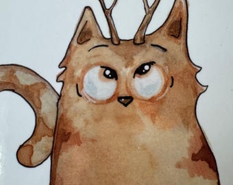 kerstkaart met grappige kat en een gewei en holografische zilveren sluitsticker