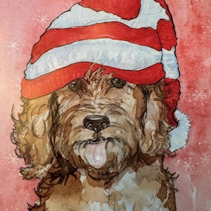 May include: Watercolor painting of a dog wearing a red and white striped hat with a white pom-pom. The dog has brown fur and its tongue is sticking out. The background is a light red with white snowflake accents.
