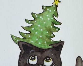 kerstkaart met grappige kat en een kerstboom op zijn kop en holografische zilveren sluitsticker