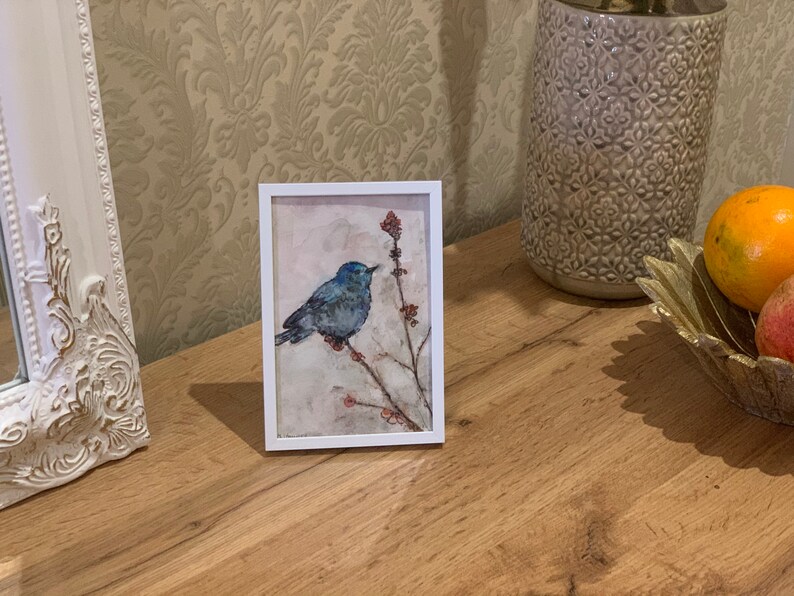 original watercolor. A beautiful blue bird on a branch