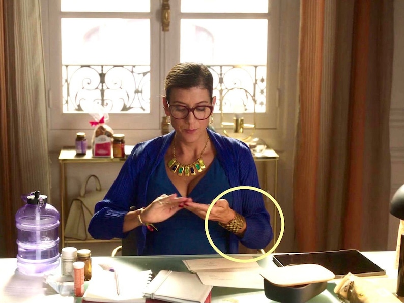 Gold cuff Emily in paris outfits