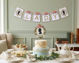 May include: A two-tiered cake with blue and cream frosting, a banner that spells "LADY", and a tea set. The cake is topped with a silhouette and floral accents. The scene is set for a tea party.
