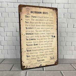 Letrero metálico divertido de estilo antiguo con reglas de baño